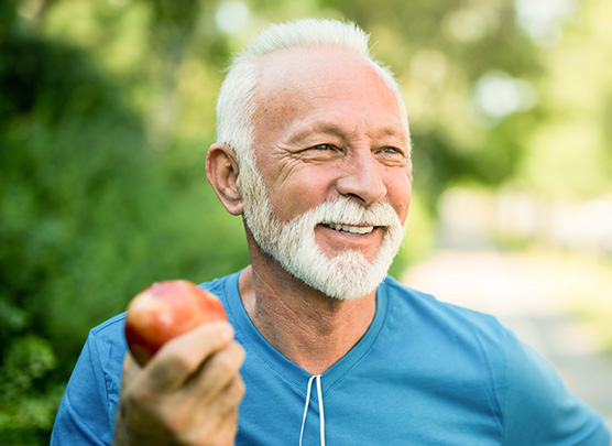 Man eating an apple