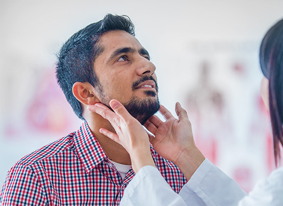 Examining patient's jaw